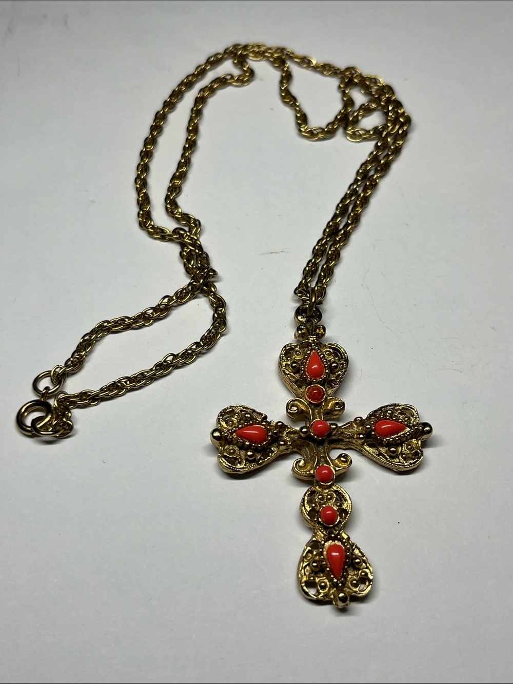 Gold-Tone Cross Pendant Necklace with Red Accents